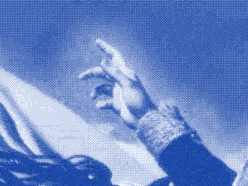 Close crop of the rider’s raised, pointing hand.