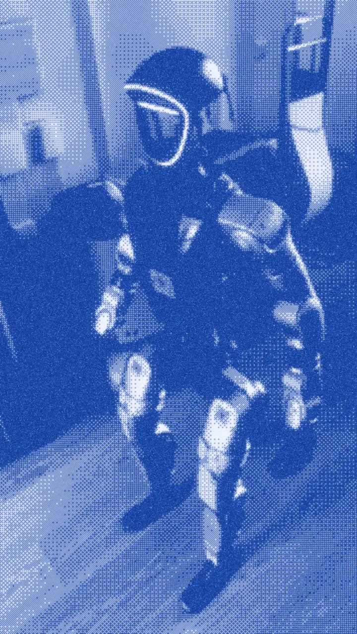 Frame from the clip: the G1 humanoid standing in a room, filmed upright on a phone.